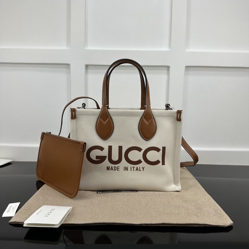 G*u*i shopping bags